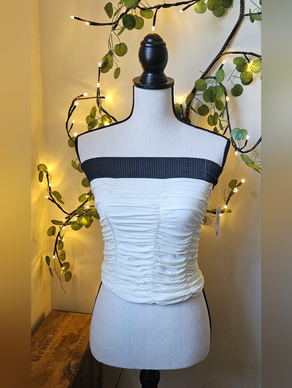 Poof! Nwt s/m ivory black, strapless tube top features a modern, minimalist silh